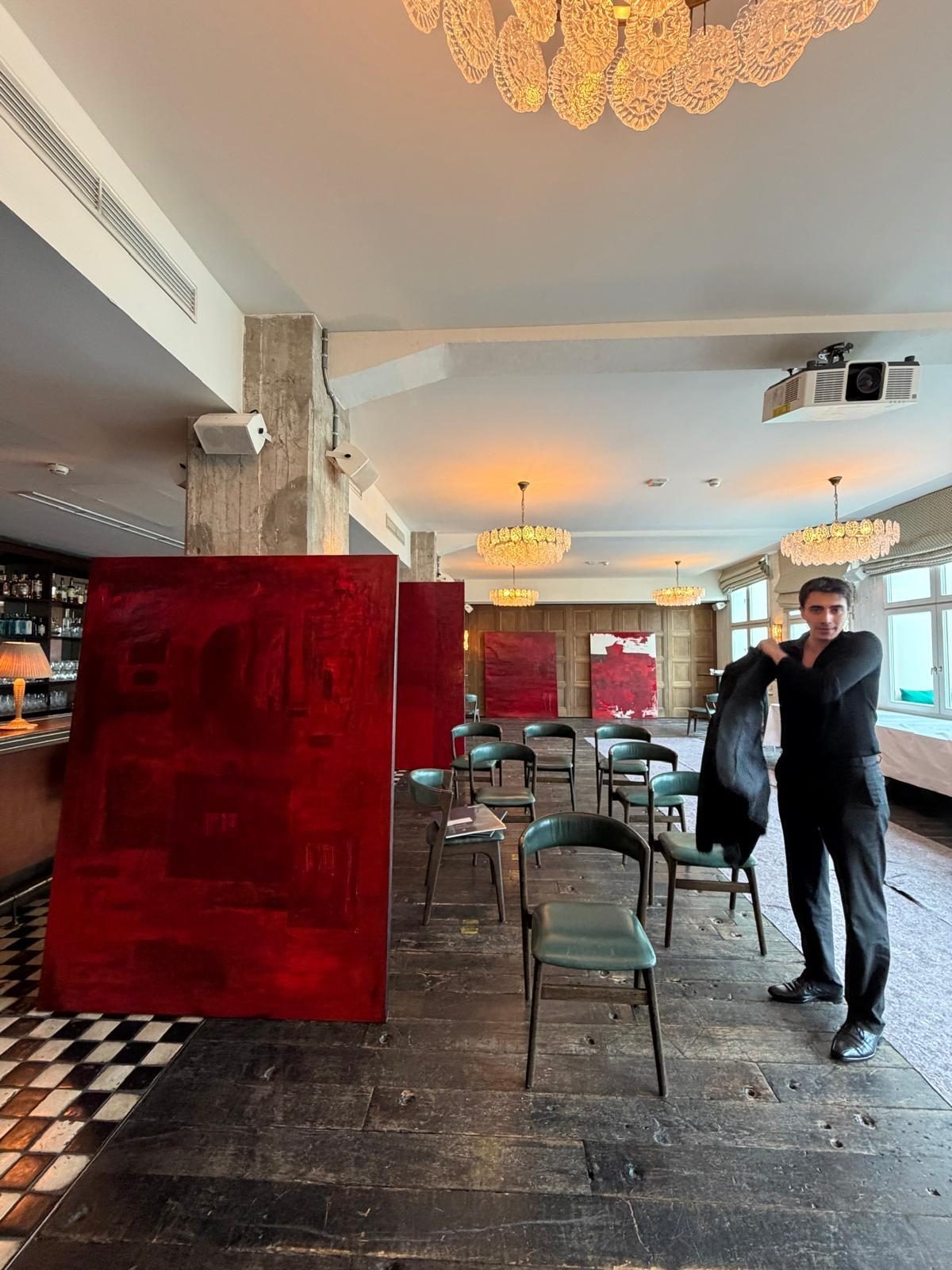 BROK with red paintings from the RED series installed at Soho House Berlin