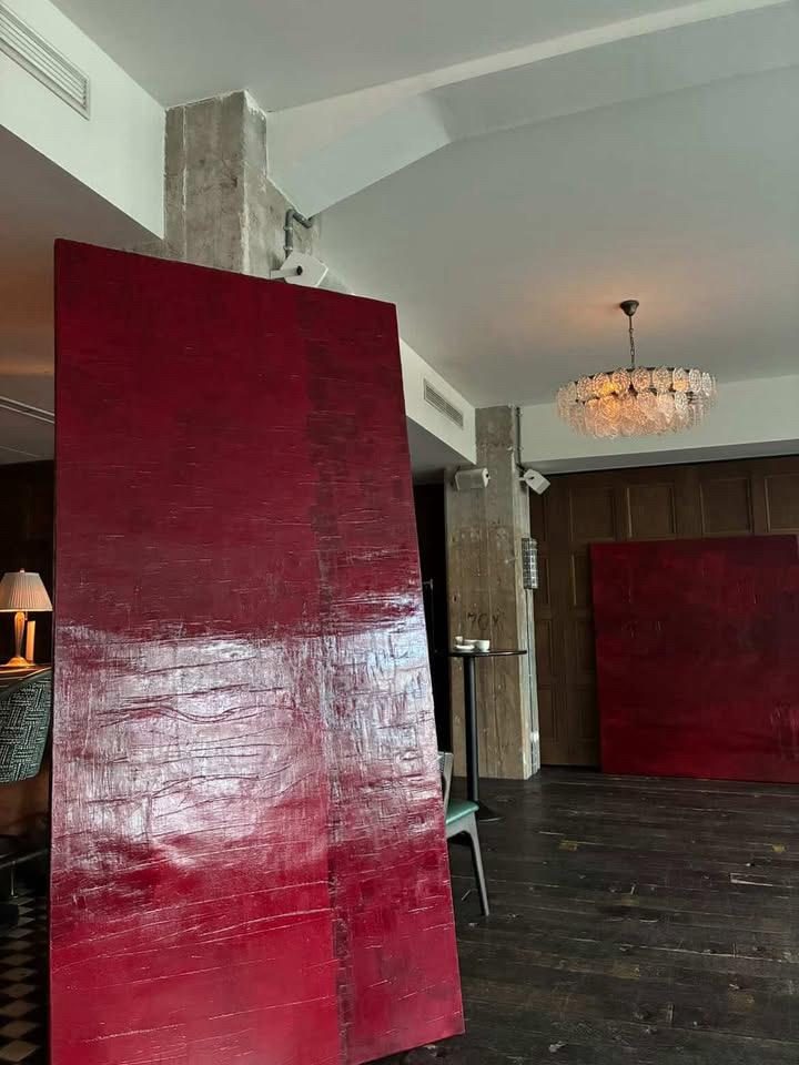 Large red painting by BROK on display at Soho House Berlin